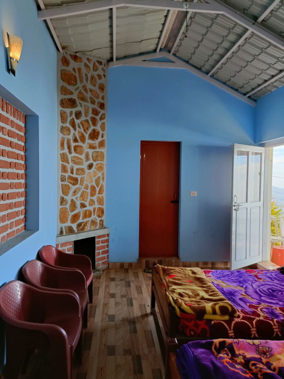 Luxurious suite room with panoramic views of Vattakanal's landscape